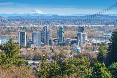 Aerial tram transporting people to the top of the hill in Portland Oregon.