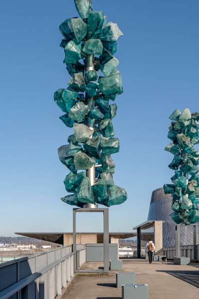 Glass art on display in Tacoma Washington outdoors overpass bridge. 