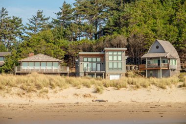 New home construction on the beach front in Manzanita Oregon state. clipart