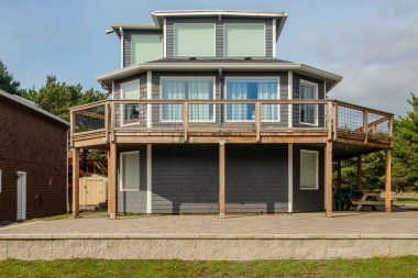 Vacation rental properties in Manzanita Oregon Pacific coast. clipart