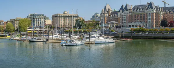 stock image Victoria BC Canada- July 22- 2024: downtown buildings tourism and transportation scene panoramic view Victoria Canada.