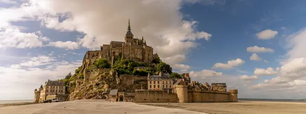 stock image A panorama picture of the famous Mont-Saint-Michel in the evening