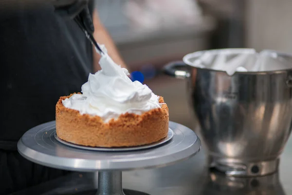 stock image catering chef preparing key lime pie in pro kitchen