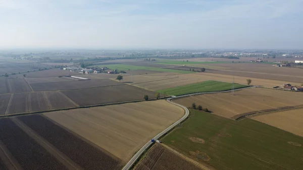 aerial view of rural ground farms and solar energy panels