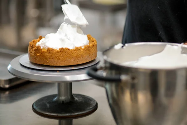 stock image catering chef preparing key lime pie in pro kitchen