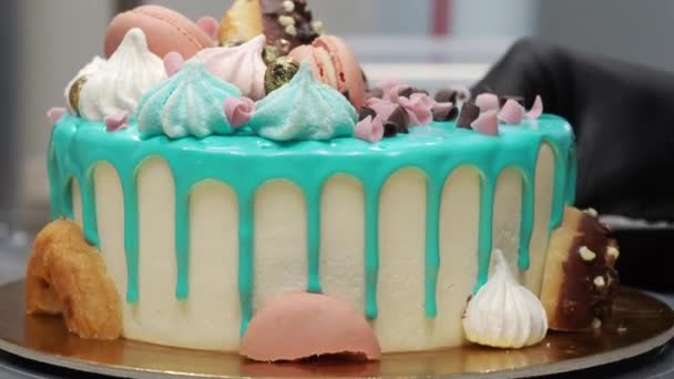 Donuts Meringue Berries Sparkles Topping Frosted Icing Drip Turquoise Cake — Stock Video