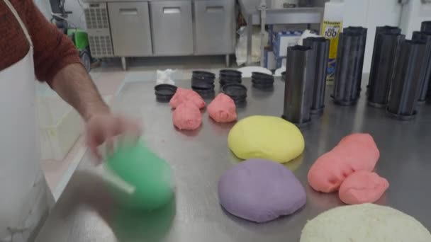 Creative Baker Kneading Massaging Smoothing Cutting Coloured Dough Bread Pizza — Stok video