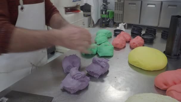 Creative Baker Kneading Massaging Smoothing Cutting Coloured Dough Bread Pizza — Vídeo de Stock