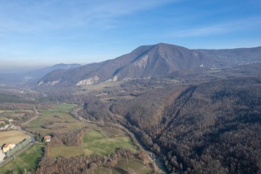 Morfasso, Piacenza, Emilia Romagna, Italy Drone view of Our Lady of Lourdes Grotto - Sperongia Parish and hills a sunny day