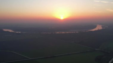 Cremona, Italy - January 2023 drone footage view at sunset in Spinadesco canal and river po scenic pano