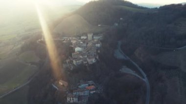 Vigoleno, Italy - 30 January 2023 drone aerial view of Vigoleno castle , fortress and village scenic panorama in Parma hills, Emilia Romagna , Italy, sunset.