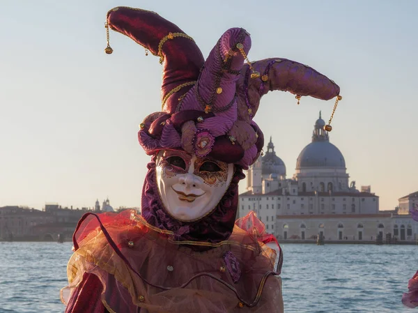 Venice, Italy - 13th february 2023 Carnival time and masked people gather in costume in Piazza San Marco area, Venezia.