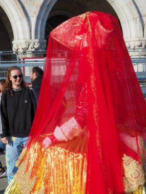 Venice, Italy - 13th february 2023 Carnival time and masked people gather in costume in Piazza San Marco area, Venezia.