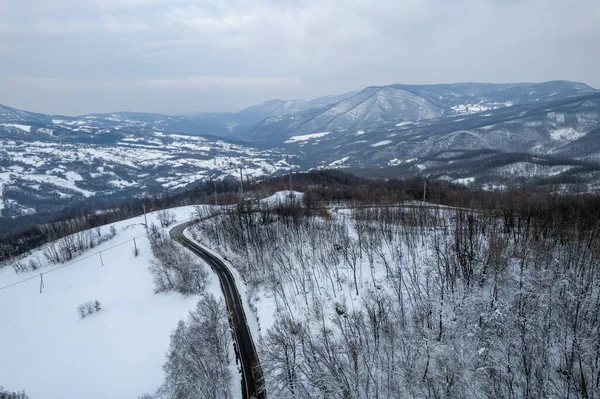 Stock image Aerial view of snowy mountain winter white landscape Vezzolacca , Emilia Romagna, Italy