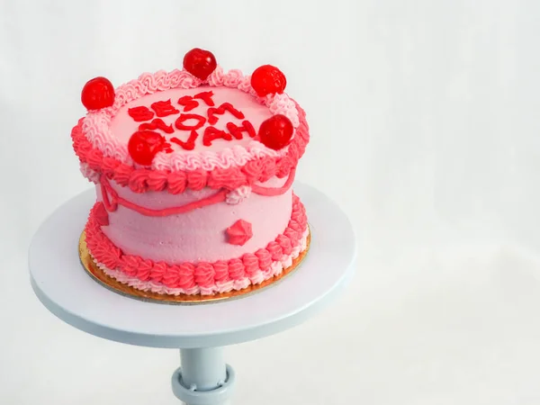 霜降りピンク赤ケーキのためにお母さんの日お祝い面白いテキストトッピングベストお母さんEvahのために白いスタジオの背景 — ストック写真