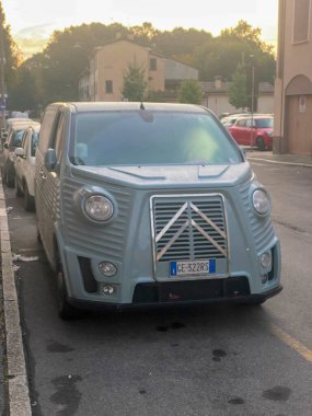 Piacenza, Italy October 15th 2024 Classic citroen type h van parked on a residential street, showcasing its restored condition and unique design clipart