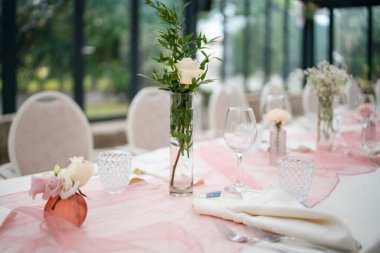 Elegant Private Event Venue Setting Ready for a Delightful Lunch Gathering with Sophisticated Table Decorations and Natural Light
