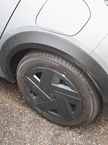Cremona, Italy - October 1st 2025 Lancia Ypsilon electric vehicle wheel with Michelin e Primacy tire on asphalt, highlighting efficient urban mobility and sustainable transport design