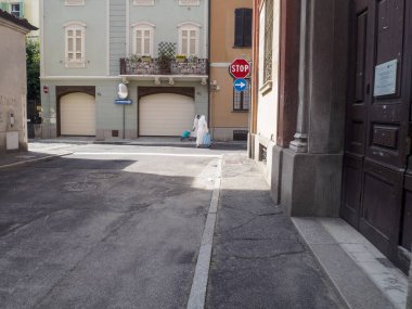 Cremona, Italy - September 18th Idyllic Cobblestone Street Scene Capturing the Timeless Charm of a Quiet Italian Village on a Sunny Afternoon Bathed in Warm Sunlight