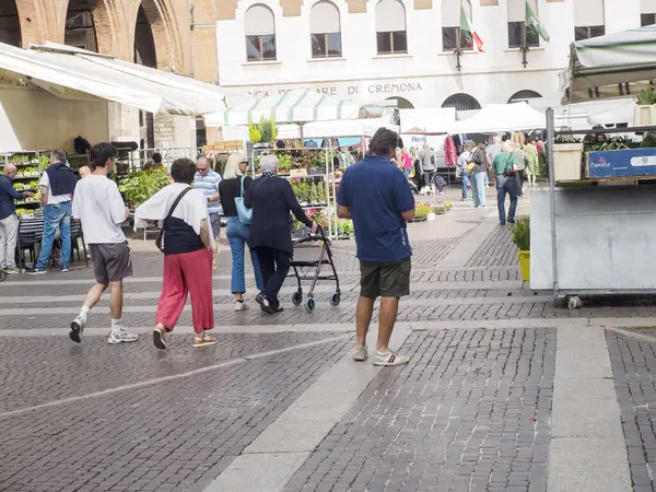 Cremona, Italy - September 18th 2025 Authentic Lombardy Italy Outdoor Market Scene Captures Local Life and Commerce Under Sunny Skies