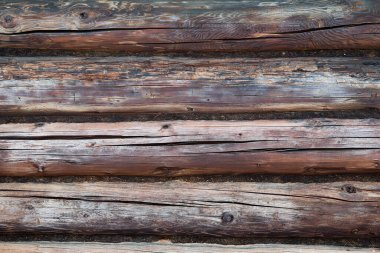 Eski kaba ahşap arka plan. Eski ev duvarı. Vintage fon. Tahta kalaslar. Ahşap doku arka planı. Eski yüzey