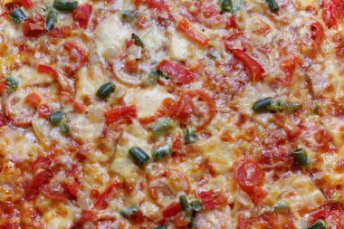 Sebzeli pizza ve arka plan olarak et..