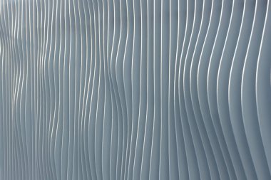 Arka plan olarak kentsel çitin metalik yapısı. Metalik çitlerin kıvrımlı soyut çizgileri.