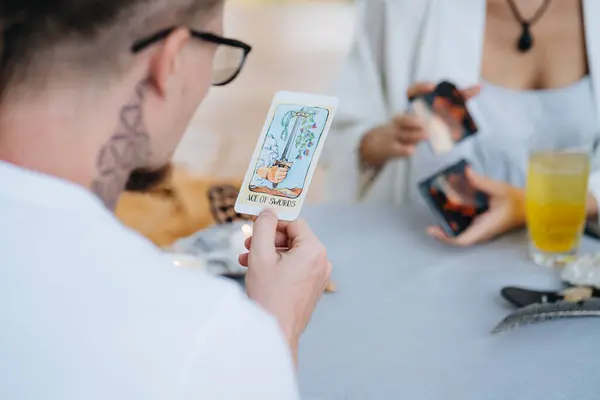 Customer Looking Tarot Card High Quality Photo Stock Photo