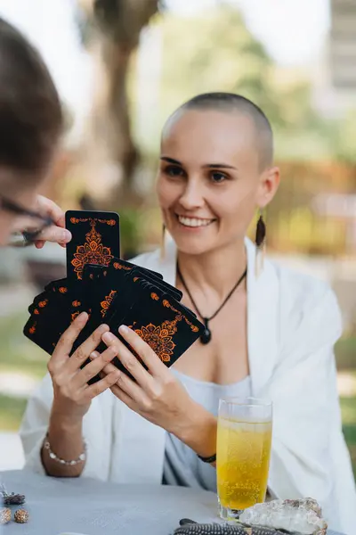 Bald Woman Tarot Reader Has Session Client High Quality Photo Stock Photo