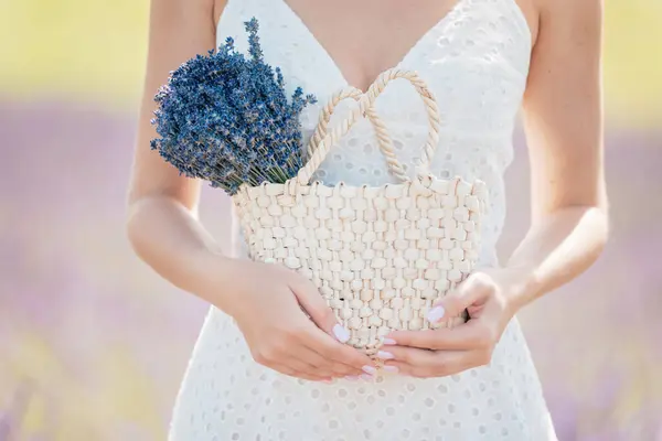 Woman White Dress Standing Holding Straw Bag Lavender Flowers Her Royalty Free Stock Images