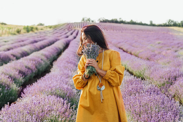 Smiling Woman Yellow Dress Holding Bouquet Lavender Flowers Standing Picturesque Royalty Free Stock Photos