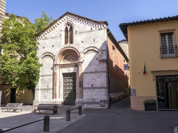The small square in front of the small church of Santa Giulia in the historic center of Lucca, Tuscany, Italy.
