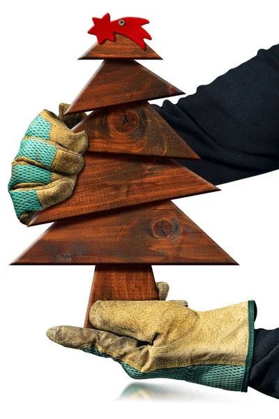 Stolarz Ochronnymi Rękawiczkami Roboczymi Trzymający Małą Brązową Drewnianą Choinkę Czerwoną — Zdjęcie stockowe