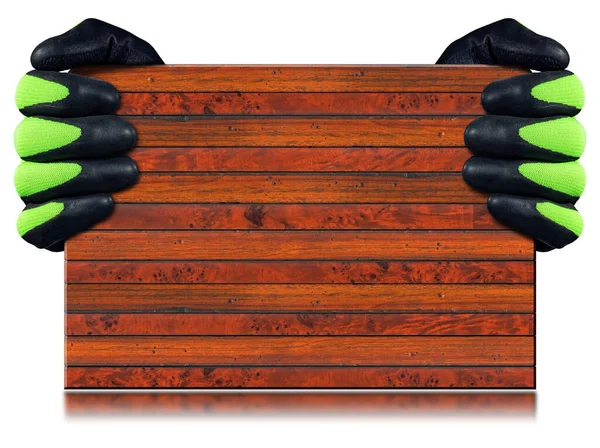 コピースペースと反射と白の背景に隔離された茶色の縞模様の木製の板を保持保護作業手袋でカーペンター — ストック写真