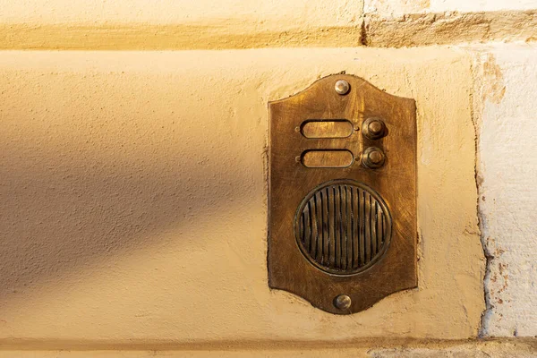 Close Brass Intercom Two Doorbells Yellow White Wall Copy Space — Stock Photo, Image