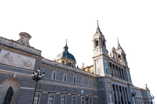 Facade of the Almudena Cathedral, isolated on white background, (Catedral de Santa Maria la Real de la Almudena) in Madrid downtown, Spain, southern Europe.