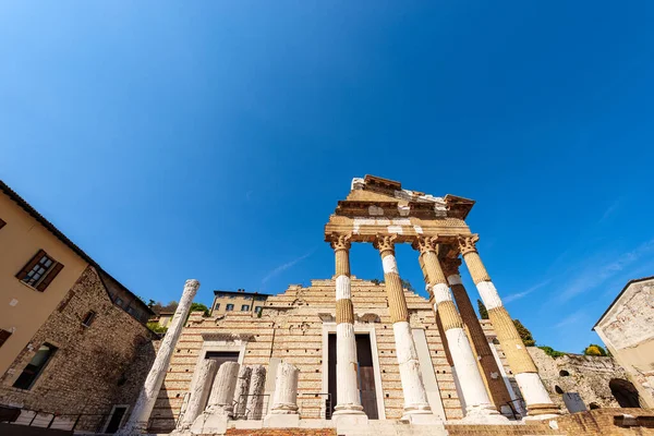 Old ruins of the Roman Temple in Brescia downtown, Capitolium (Tempio Capitolino), 73 AC, UNESCO world heritage site, Lombardy, Italy, Europe.