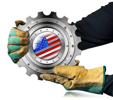 Manual worker with work gloves holding a metallic cogwheel with the national flag of the United States of America, USA (American flag), isolated on white background.