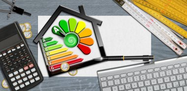Ev enerjisi verimliliği derecesi. Masasında enerji verimliliği grafiği, hesap makinesi, katlama cetveli, çizim pusulası, kalem ve bilgisayar klavyesi olan küçük siyah bir ev.