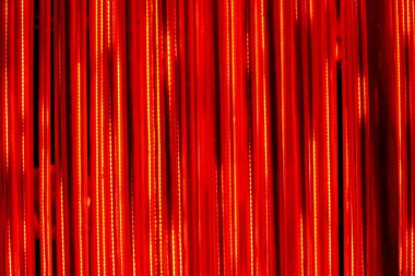 Soyut arkaplan. Ateş hatları - kırmızı ve turuncu ışıklar.