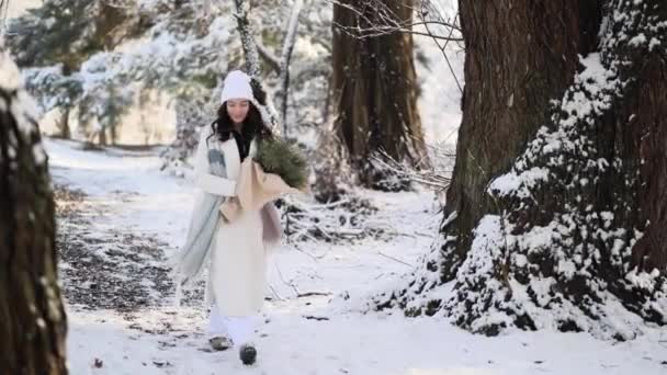 Happy Young Smiling Woman Walks Winter Forest Snow Covered Trees — Stockvideo