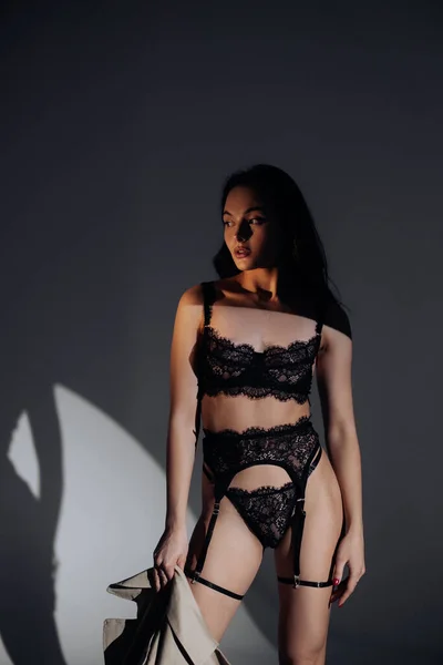Young Sexy Woman Poses Standing Black Lacy Lingerie Bdsm Style — стоковое фото