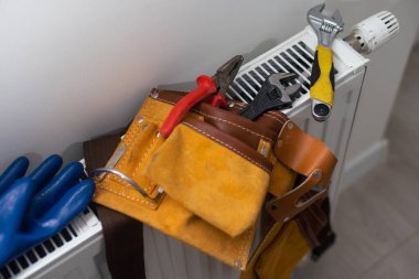 tools on the radiator close up clipart