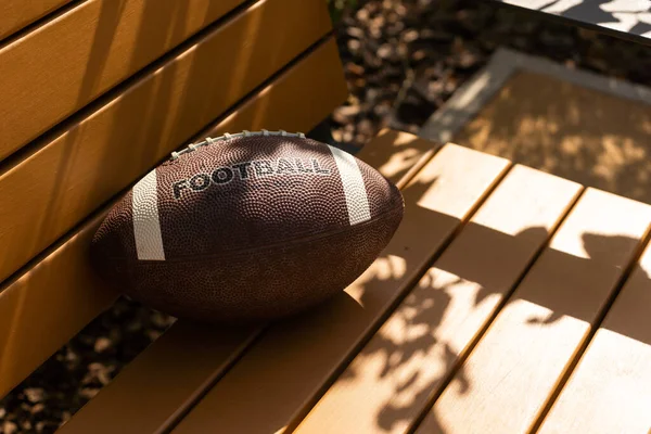 American Leather Football Ball Wooden Bench —  Fotos de Stock