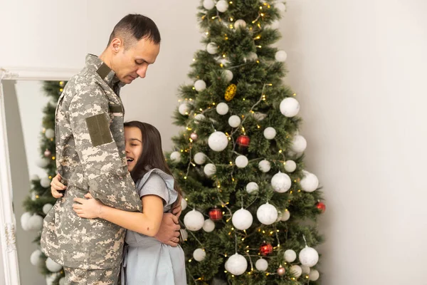 stock image Christmas and Army. veteran and his daughter for christmas.