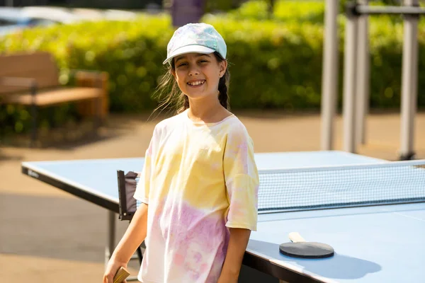 Young Teenager Girl Playing Ping Pong She Holds Ball Racket — Fotografia de Stock