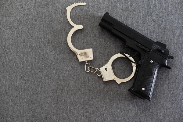 Black Gun Metal Handcuffs Lie Black Background Private Detective Work — Φωτογραφία Αρχείου