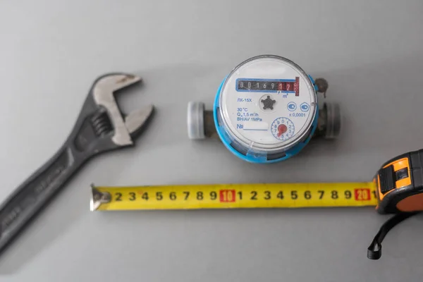 water meter and tape measure.