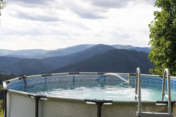 landscape view of swimming pool and top of mountain view and nature.