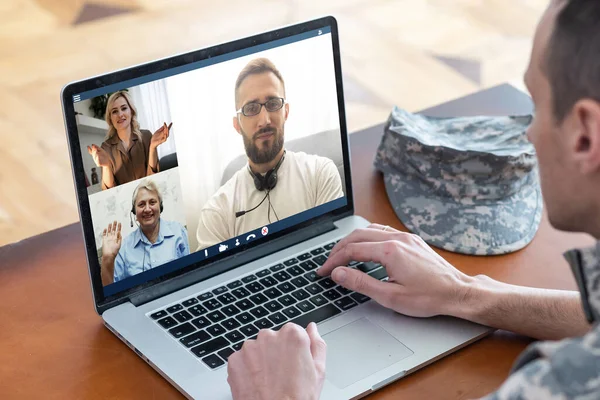 stock image Ask general practitioner online, video call consultation, patient and doctor talk concept. Head shot of mature male therapist share information provide support, laptop screen view, videoconference app
